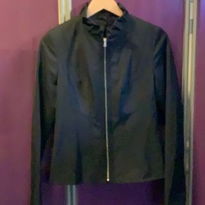 Tahari black lined jacket with detailed bodice.